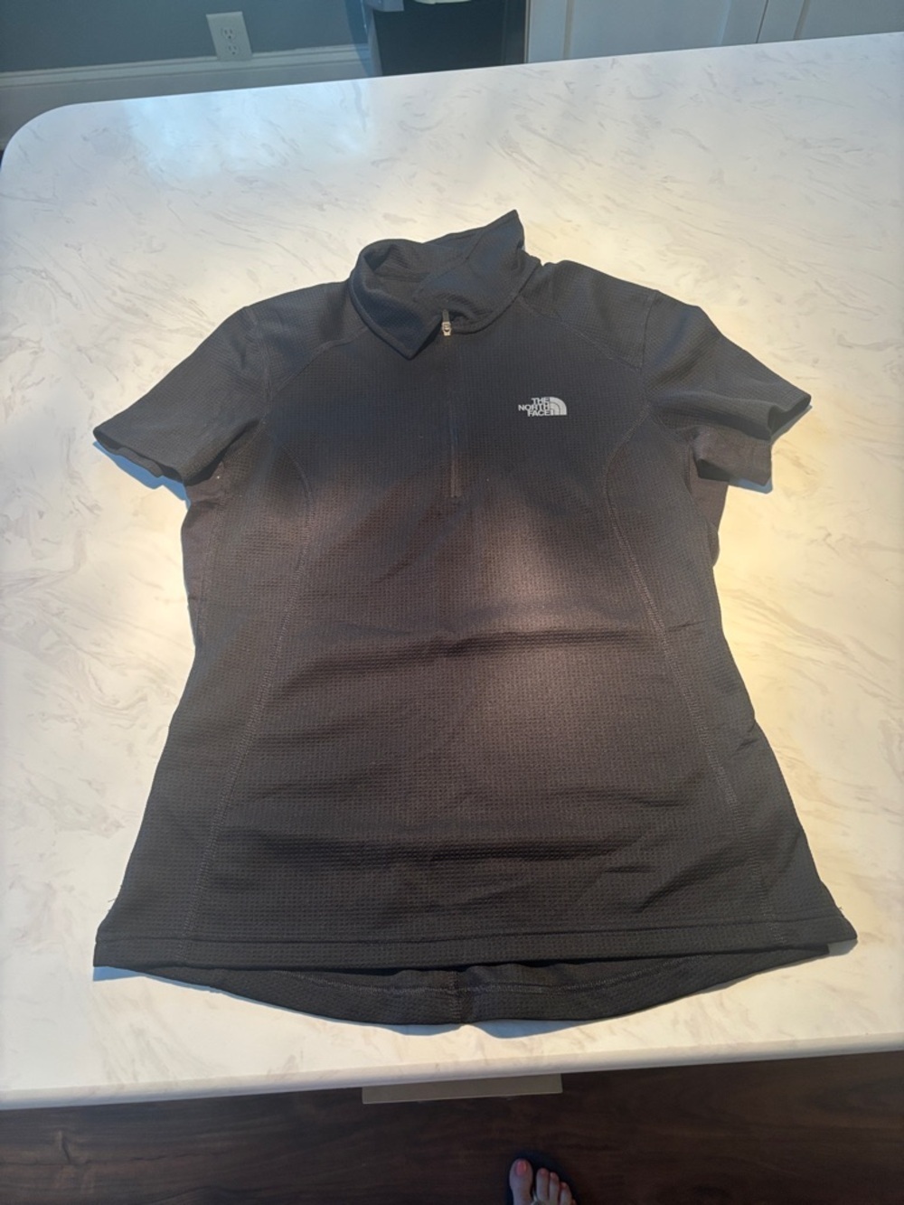 The North Face Vapor Wick Women's Short-Sleeve Half-Zip Top in Black
